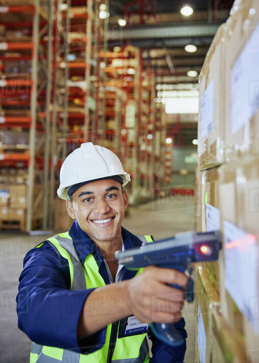 Warehouse associates working at a packing station