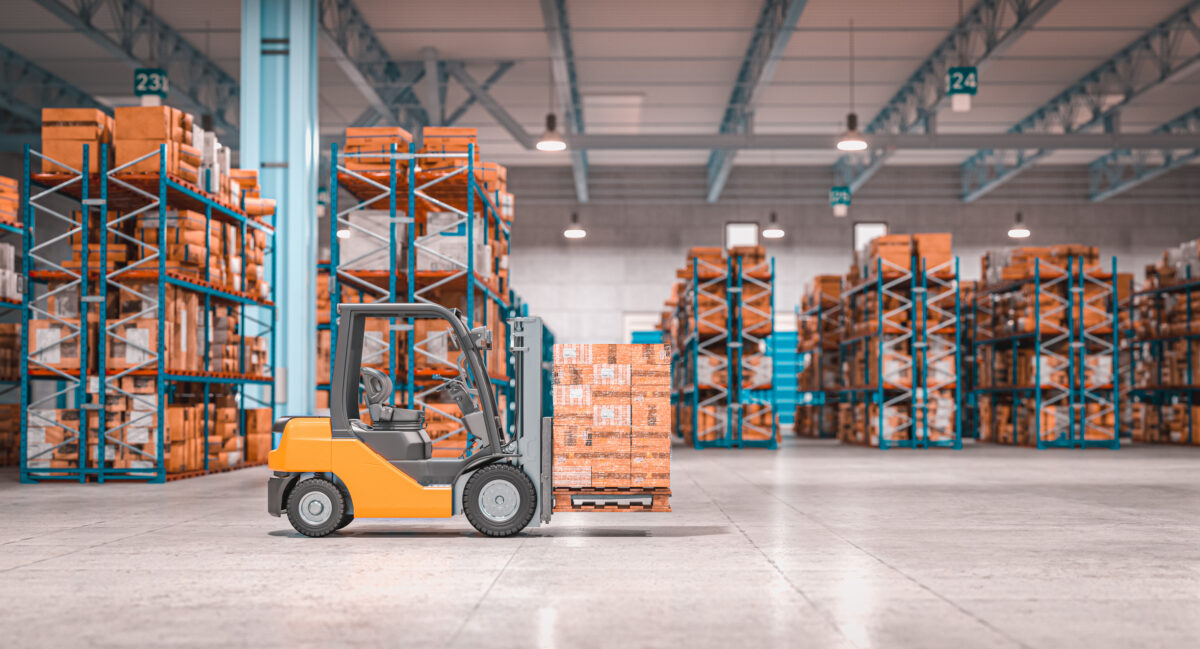 Forklift moving a pallet through a warehouse distribution facility